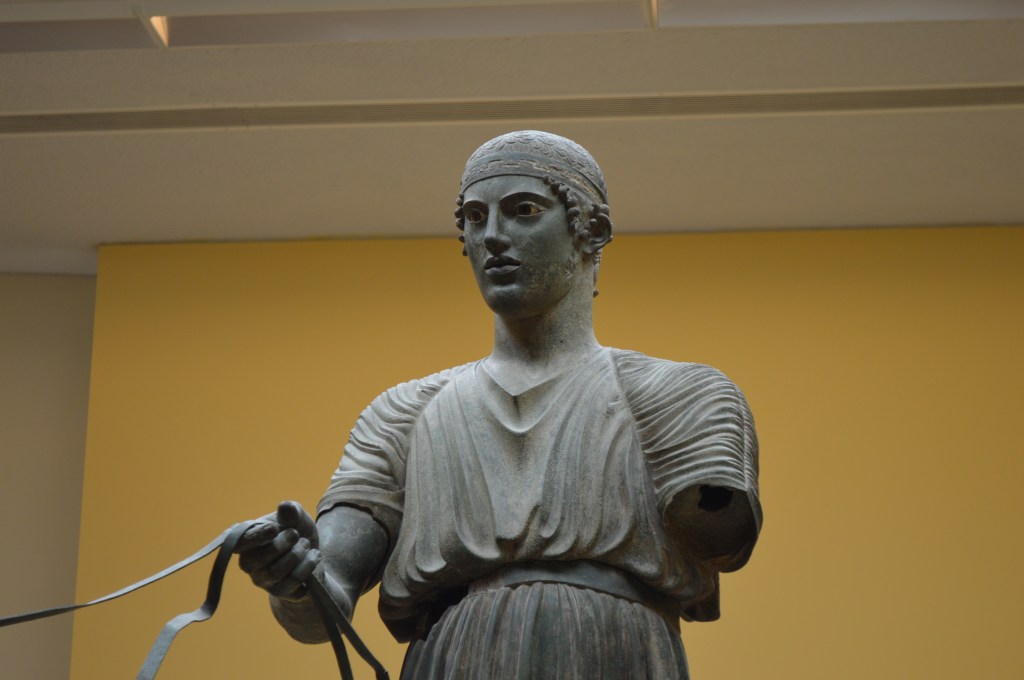 The Charioteer, 2017 Photograph The infamous charioteer bronze statue of Delphi