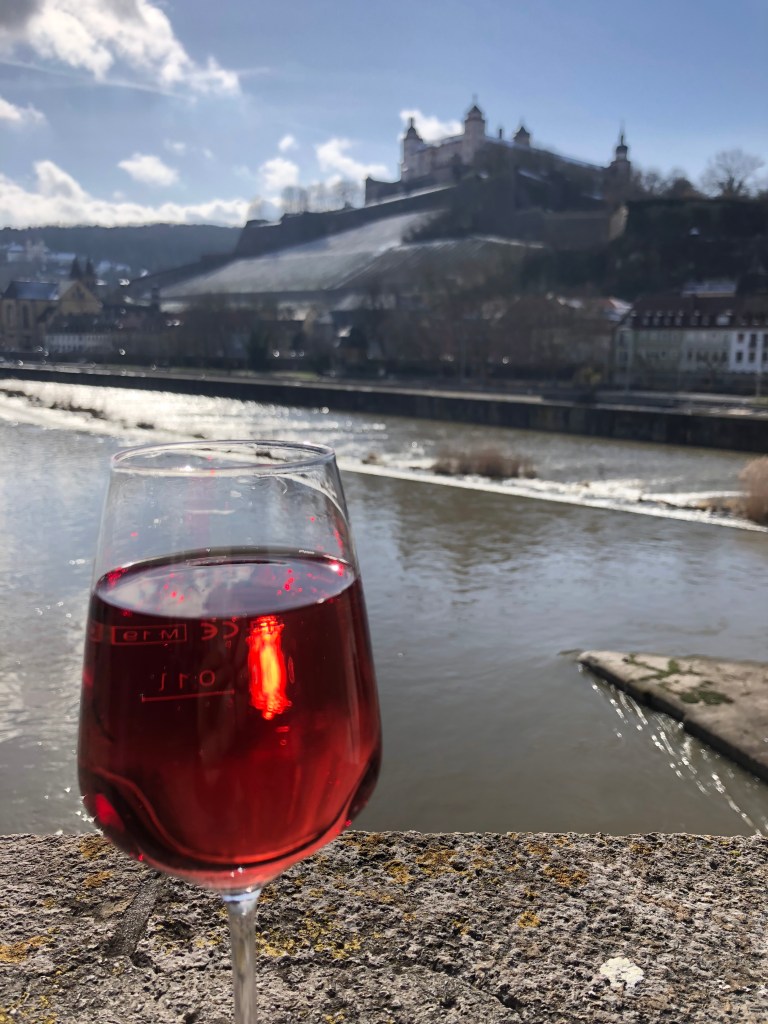 Wine in Würzburg, 2020 Photograph In Würzburg, there is a bridge where tourists can drink wine purchased at nearby stores.